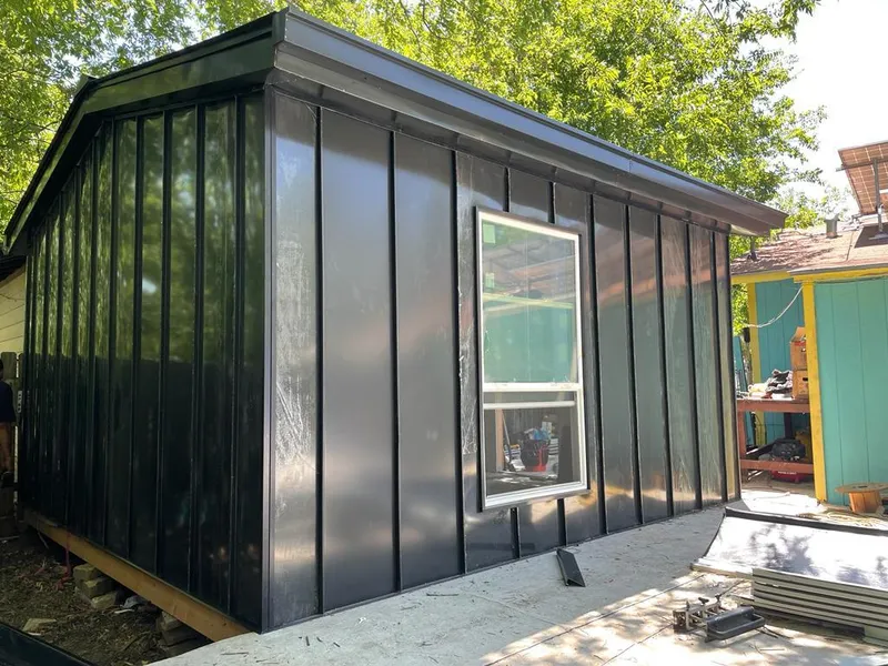 Black standing seam metal wall panels for Metal Roof Installation in Starke