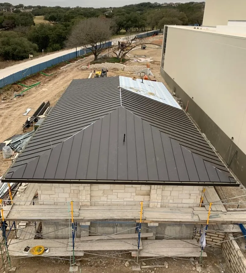 Metal roof new construction with scaffolding in Starke